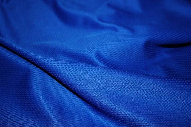 10 Jenis Bahan Jersey: Kelebihan, Kekurangan dan Rekomendasi (Lengkap 2026) 8 Contoh Bahan Jersey Stella
