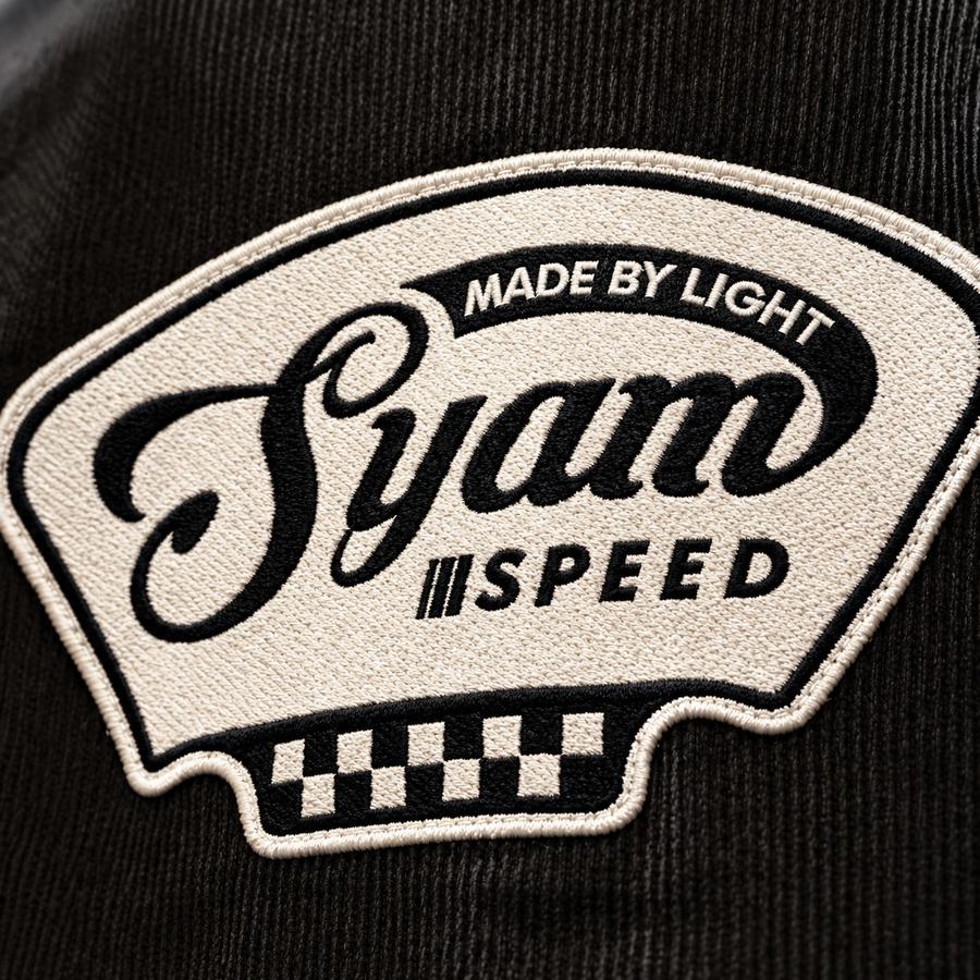 Detail patch bordir Syam Speed pada work jacket corduroy
